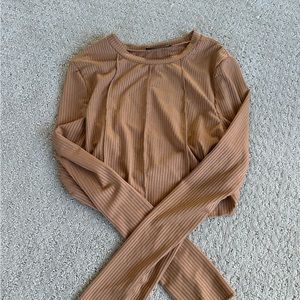 Cropped along sleeve